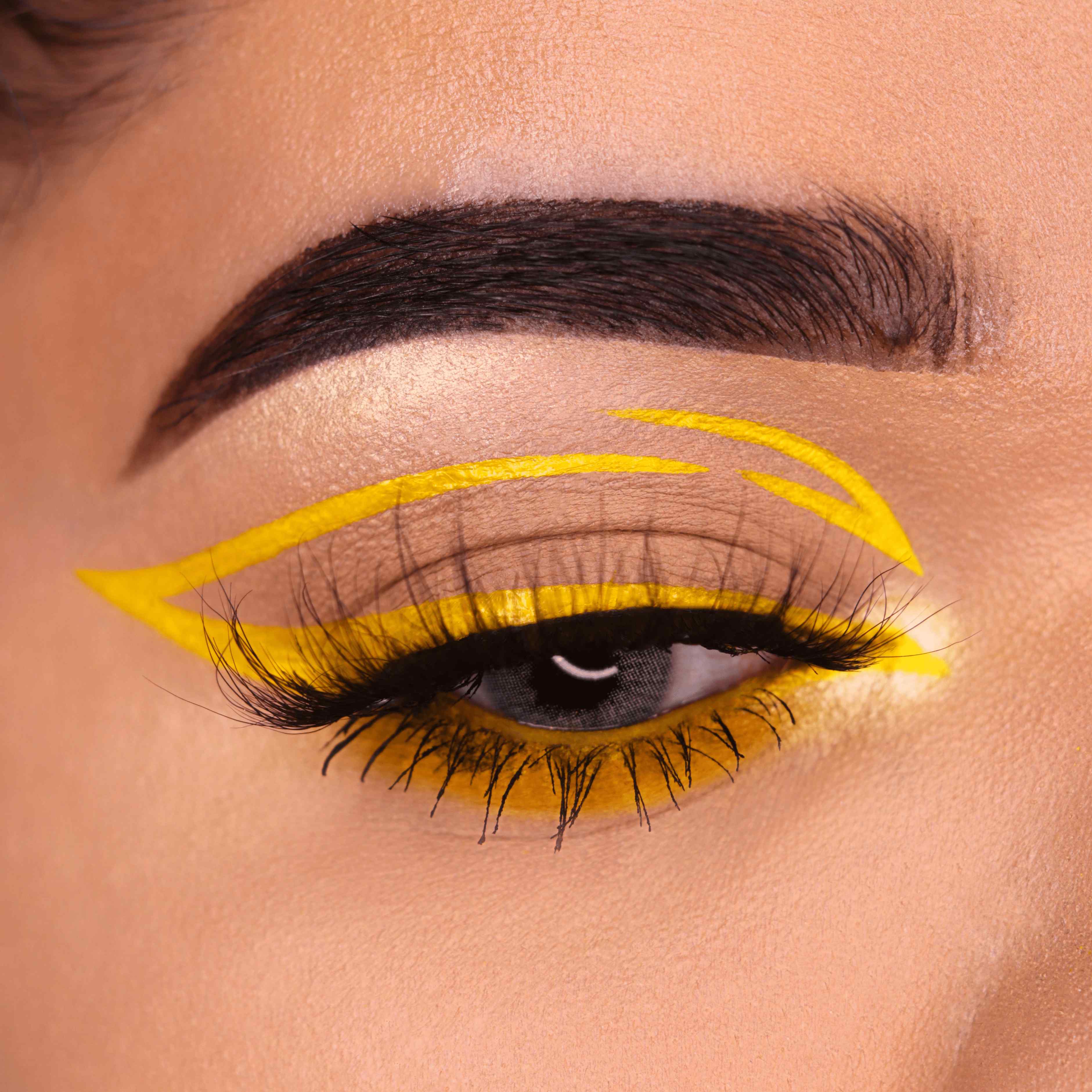 Close-up of Liquid Adhesive Eyeliner - Yellow applicator tip